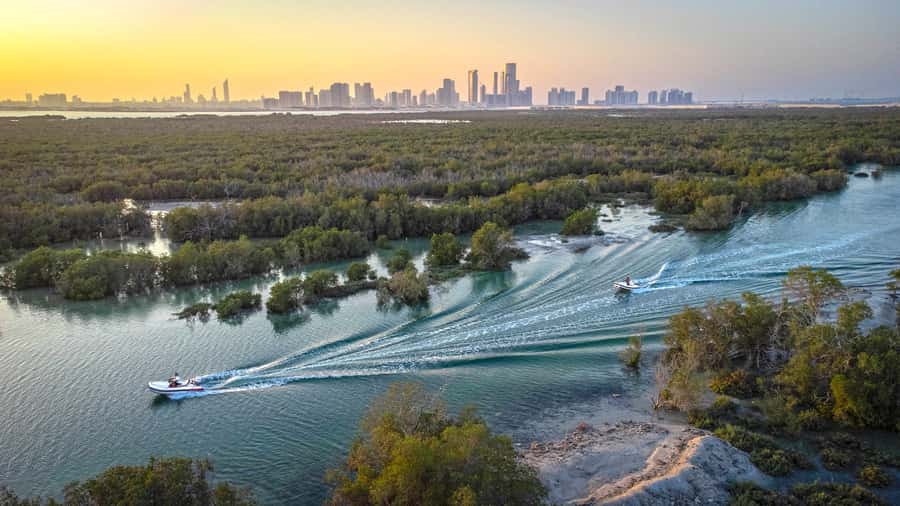 Abu Dhabi: Yas Island Self-Driving Guided Speedboat Tour - Aldar Headquarters and the Al Raha Creek skyline