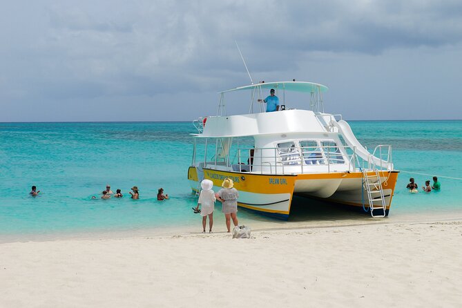 Afternoon Half Day Cruise from Providenciales with Snorkeling and Iguana Island - Iguana Island, beaches, and two sides of the sea