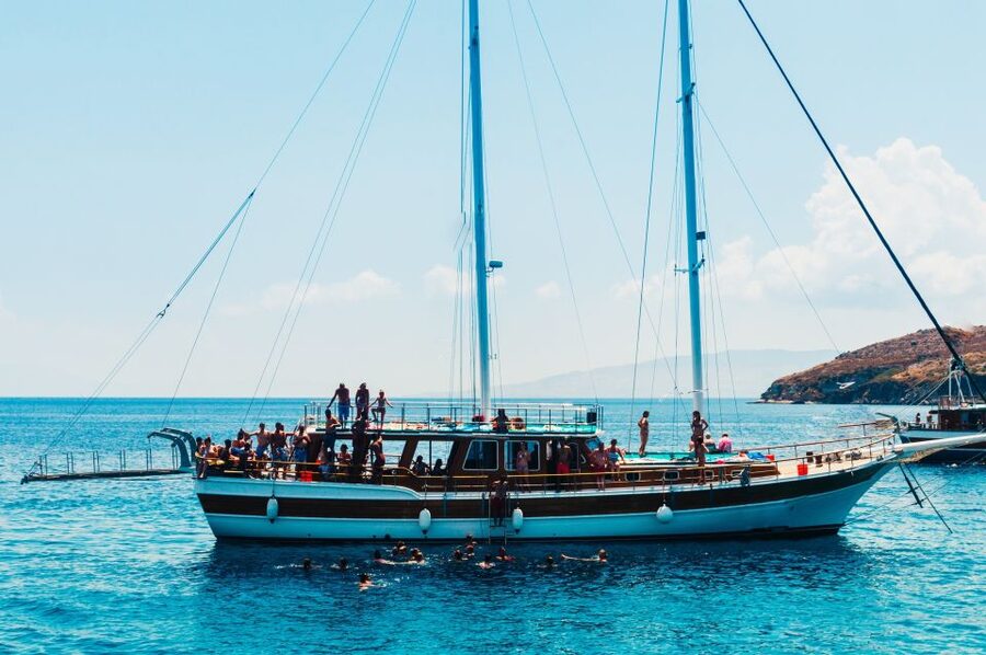 Athens: Full-Day Island Hopping Cruise with Lunch & Transfer - Agistri: pine hills, clear water, and village time