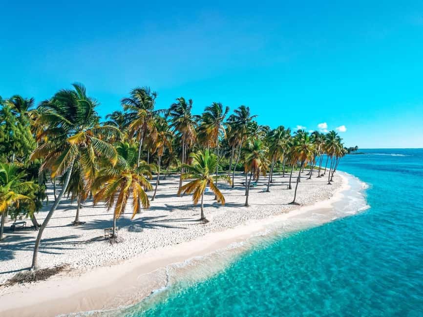 Bayahibe: Saona Island Catamaran Cruise with Natural Pool - Sailing the coast toward Saona Island