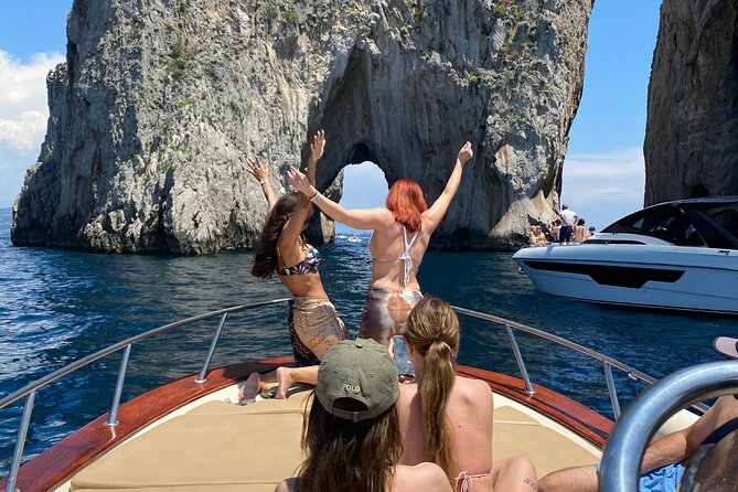 Boat Tour of the Caves on the Island of Capri - Faraglioni rocks and the swim stop