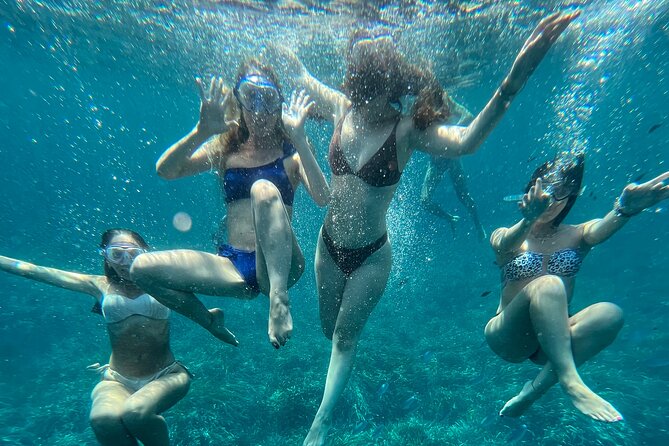 Boat tour to Egadi Favignana and Levanzo islands from Trapani - Cala Rossa delivers the famous cove moment