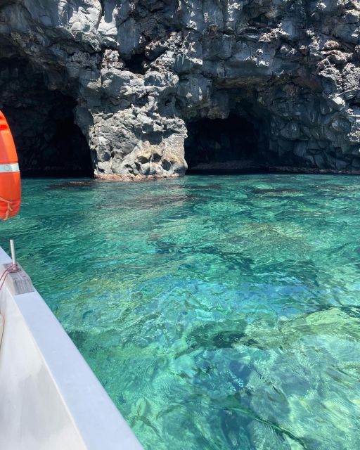 BOAT TOUR WITH APERITIF ON BOARD IN THE CYCLOPS ISLANDS - The Caves of Ulysses and a swim in the coastal water