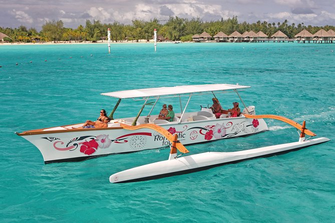 Bora Bora Snorkel Cruise by Polynesian Outrigger Canoe with BBQ Island Lunch - Sharks and stingrays in shallow water