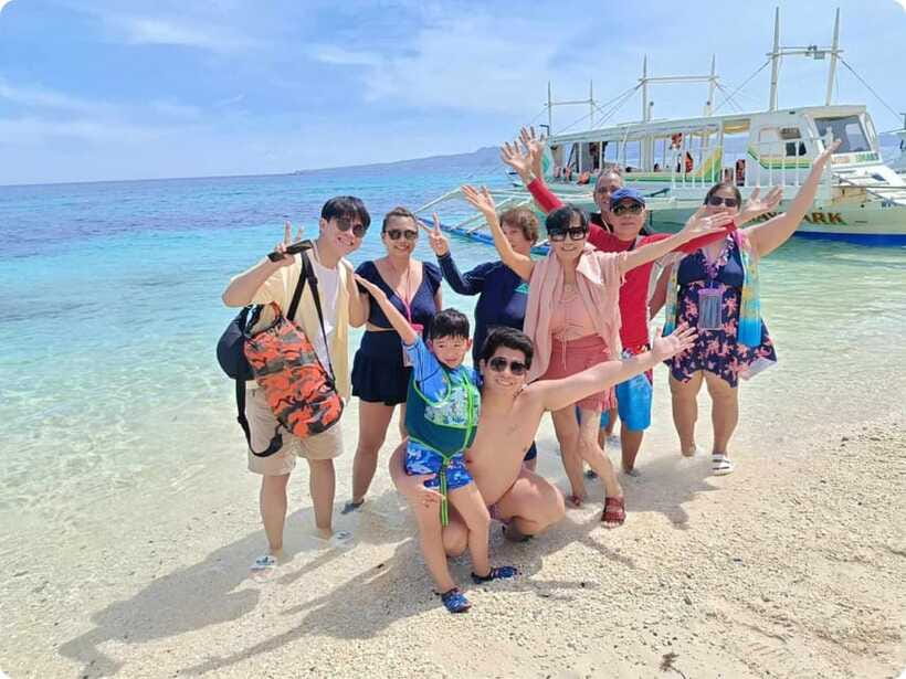 Boracay: Parasailing, Island Hopping, ATV Ride and Kawa Bath - Snorkeling and water sports fill the middle morning