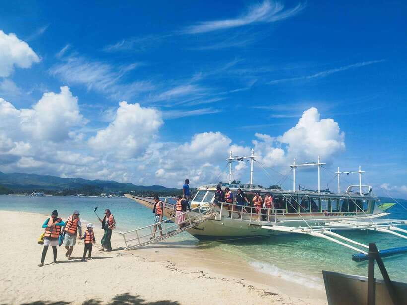 Boracay: Private Island Boat Tour and Lunch with Seaview - Meeting the boat at White Beach