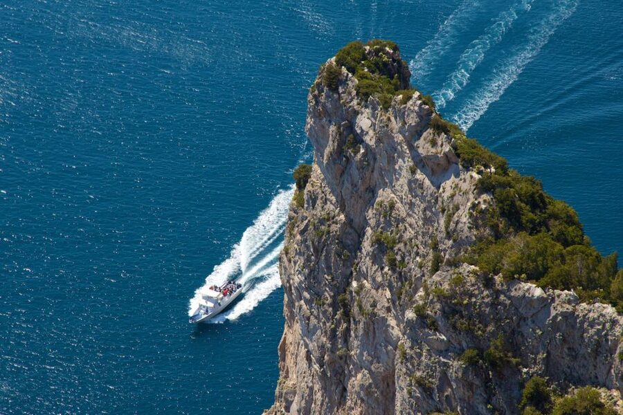 Capri: Guided Island Boat Tour With a Stop at the Caves - Sea conditions, comfort, and photography