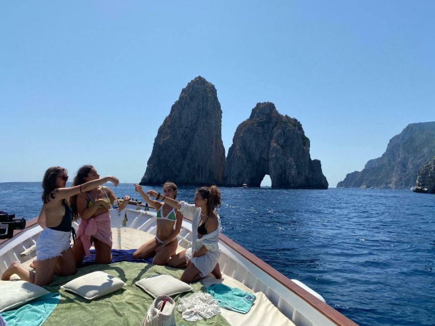 Capri: Island and Grottos Boat Cruise with Snacks and Drinks - Snacks, drinks, and the limoncello finish