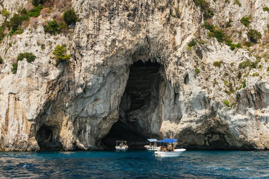 Capri: Island Boat Tour and Optional Blue Grotto Visit - Tiberius’s Leap and Capri’s darker stories