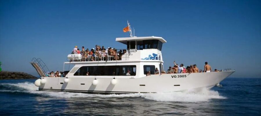 Capri: Island Boat Tour with Blue Grotto Stop - Salto di Tiberio begins the coastal story