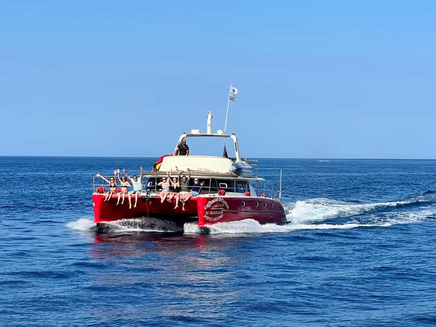 Catamaran cruise to the Lavezzi Islands - Sailing Past Cavallo, the Billionaires’ Island