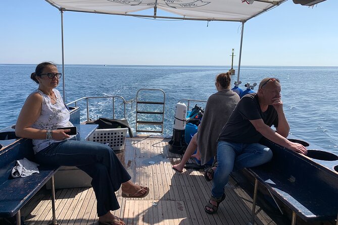 Catania: Cyclops Islands & Timpa Nature Reserve Boat Tour - Drinks, fruit, and the small comforts