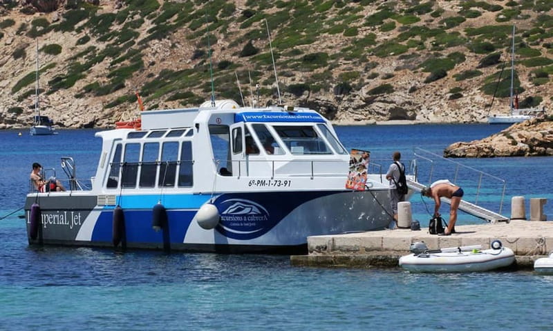 Colonia Sant Jordi: Sunset Boat Tour to Cabrera Island - Cabrera port and the castle above the water