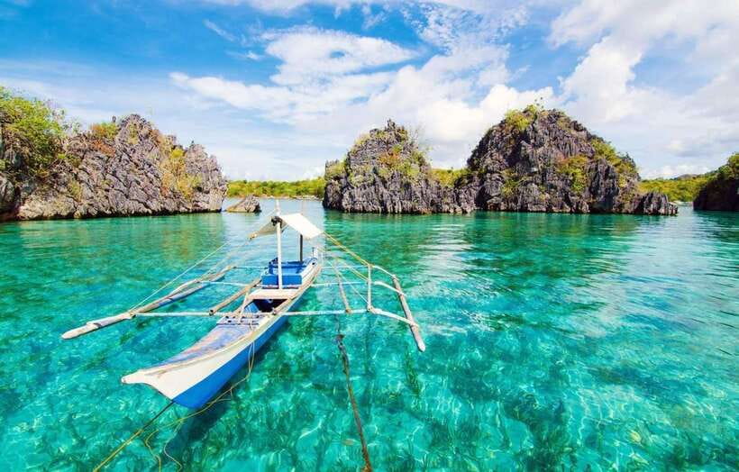 Coron: Coastal Cliffs, Beach & Malcapuya Island Hopping Tour - Banana Island begins with sand and hammocks