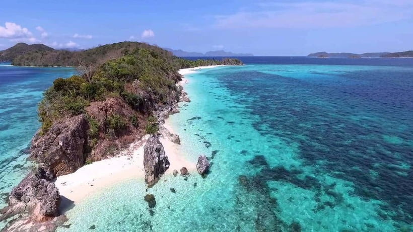 Coron: Coastal Cliffs, Beach & Malcapuya Island Hopping Tour - Bulog Dos offers a quieter final stop