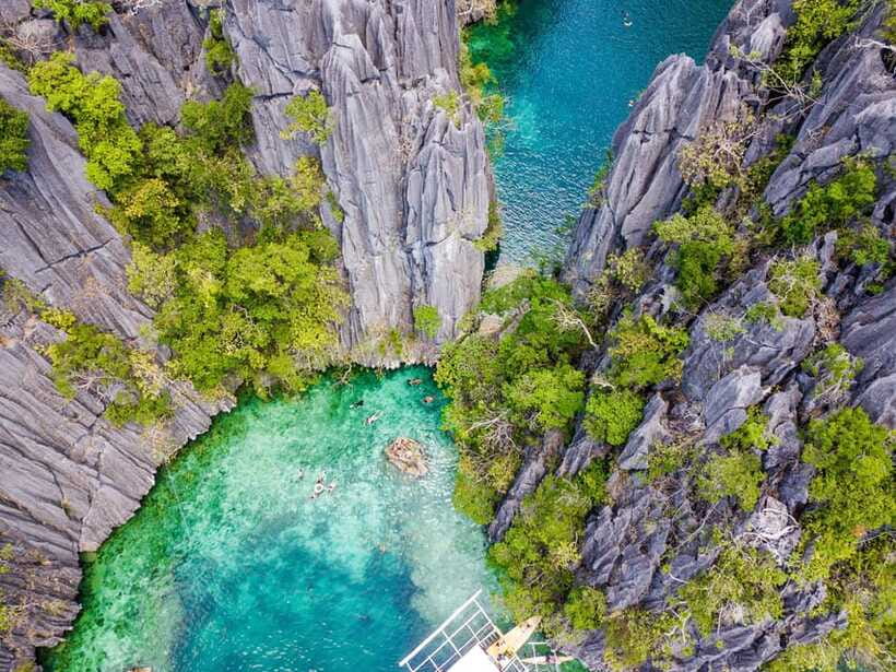 Coron Island Hopping: Super Ultimate Private Tour - Twin Lagoon means swimming through a cliff opening