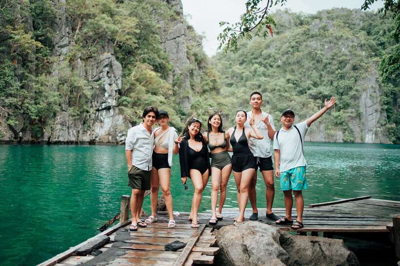 Coron: Private Island-Hopping Tour on a Yacht or Speedboat - Twin Lagoon between limestone cliffs