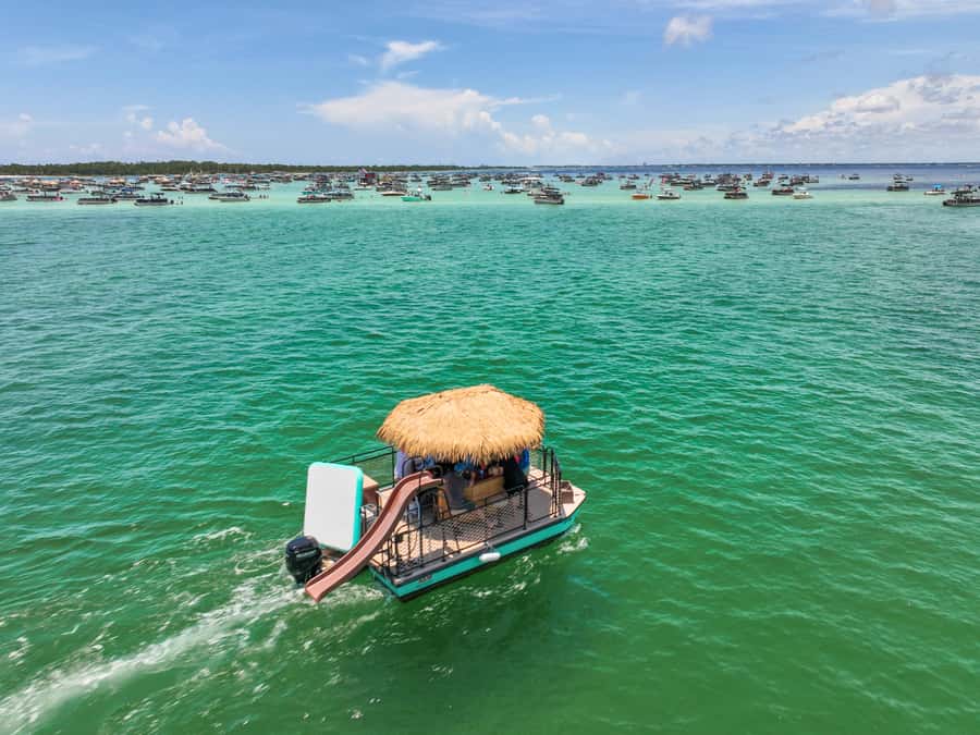 Destin: Tiki Pub Crab Island Sandbar Cruise with Waterslide - Meeting at Gilligan’s Marina