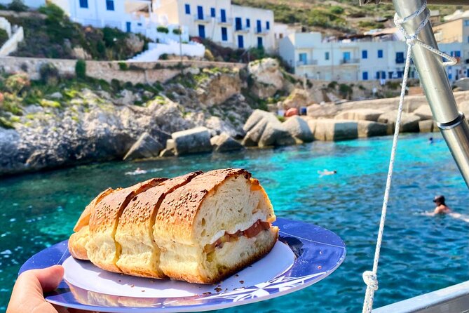 Egadi Islands Tour Favignana Levanzo by Boat with Lunch from Trapani - Bue Marino brings caves and the first aperitif