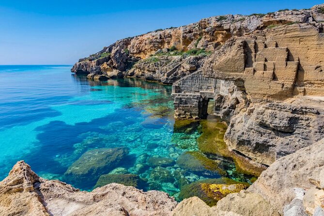 Egadi Islands Tour Favignana Levanzo by Boat with Lunch from Trapani - Cala Azzurra starts the swimming day