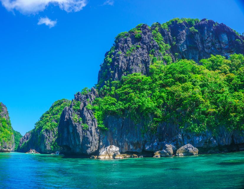 El Nido: Full-Day Premium Island Hopping Catamaran Cruise - Snorkeling, swimming, and kayaking without the rush