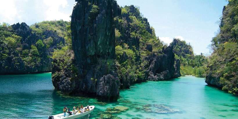 El Nido: Island Hopping Tour A Lagoons and Beaches - Seven Commandos Beach adds the easy beach break