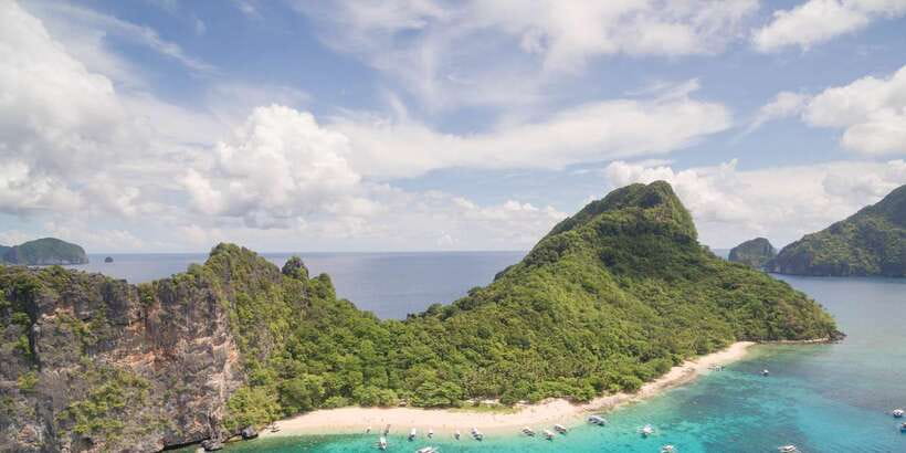 El Nido Island Hopping Tour C: Hidden Beaches & Shrine - Hidden Beach, where the limestone closes in