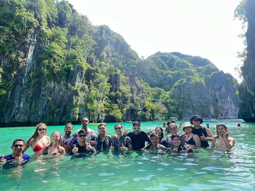El Nido: Shared Island Hopping Tour C with Buffet Lunch - Hidden Beach rewards a short swim