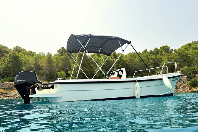 Explore the West coast of the island Brac by BETINA boat - Taking the wheel from Milna