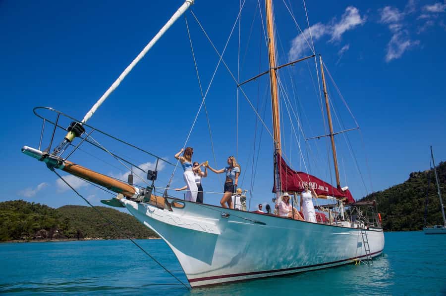 From Airlie Beach: Hook Island Cultural Tour, Sail & Snorkel - Sailing through the Whitsunday Islands