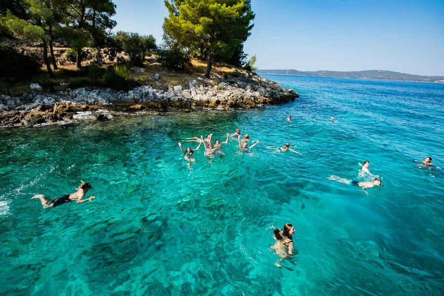 From Brač Island: Catamaran Tour with Food & Drinks - Chicken salad and an open bar at sea