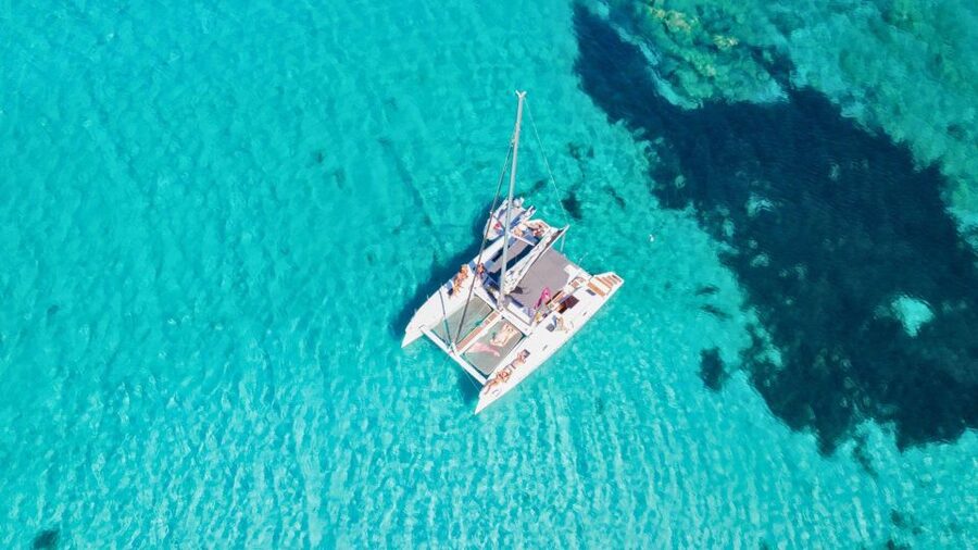 From Cannigione: Catamaran tour among La Maddalena islands - Swimming, snorkeling, and reaching the beaches