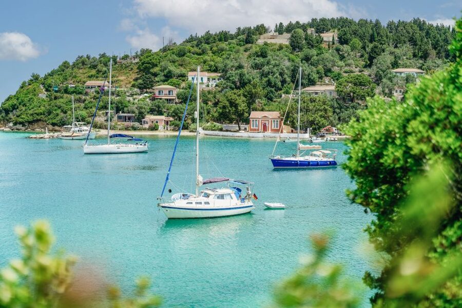 From Corfu Island: Antipaxos & Paxos Blue Caves Boat Cruise - The Blue Caves are a short but memorable passage