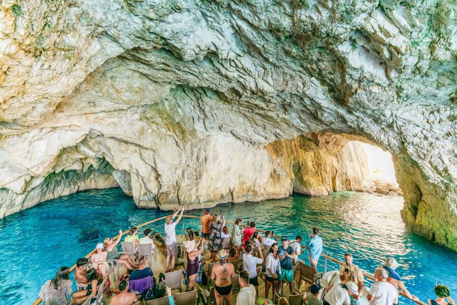 From Corfu Island: Antipaxos & Paxos Blue Caves Boat Cruise - Food, drinks, seating, and group size