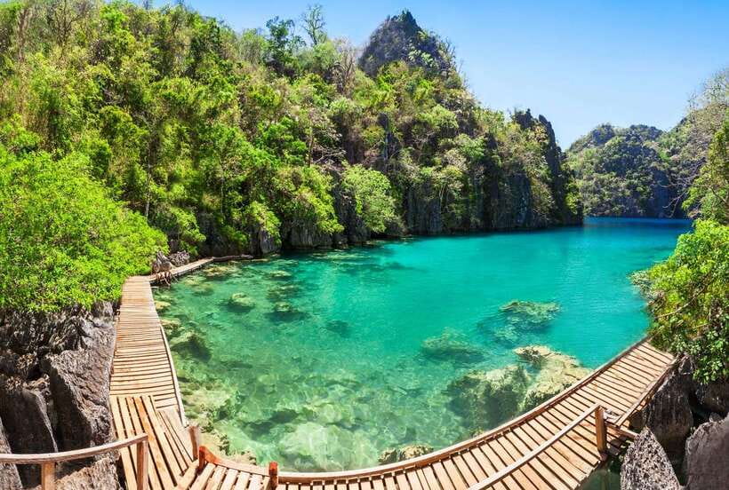 From Coron: Island Hopping Boat Day Trip with Buffet Lunch - Twin Lagoon and the change between waters