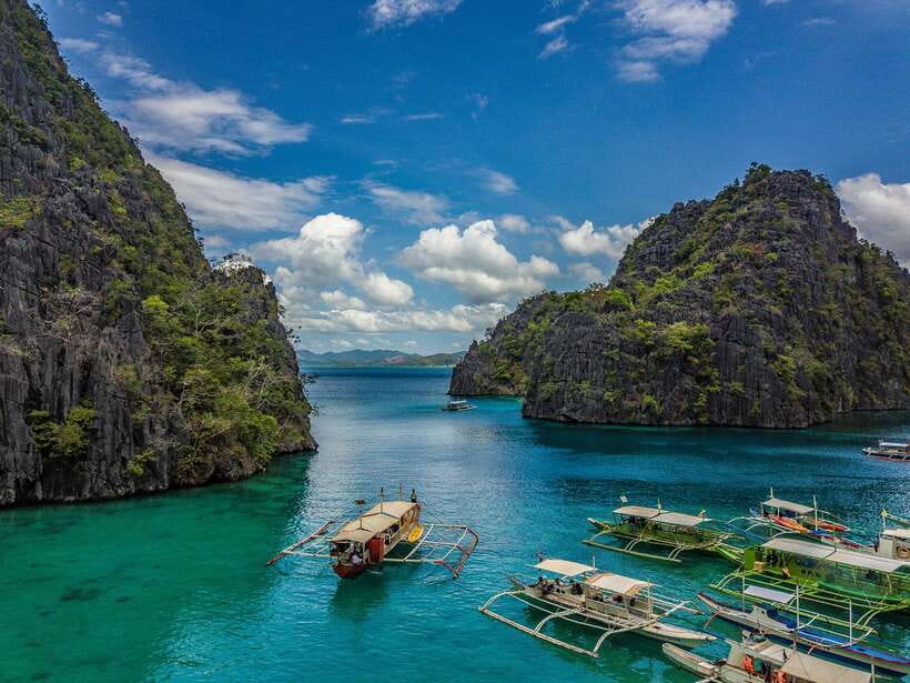 From Coron: Island Hopping Boat Day Trip with Buffet Lunch - Malcapuya Island and the beach portion of the day