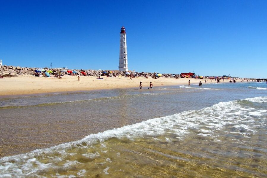 From Faro: 4 Stops, 3 Islands in Ria Formosa Catamaran Tour - Hangares and the work behind Ria Formosa oysters