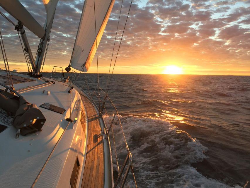 From Heraklion: Sunset Cruise to Dia Island - Snacks, fruit, and drinks on board