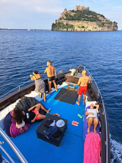 From Ischia: Procida Island Full-Day Boat Tour with Lunch - Ischia’s coast and Aragonese Castle from the sea