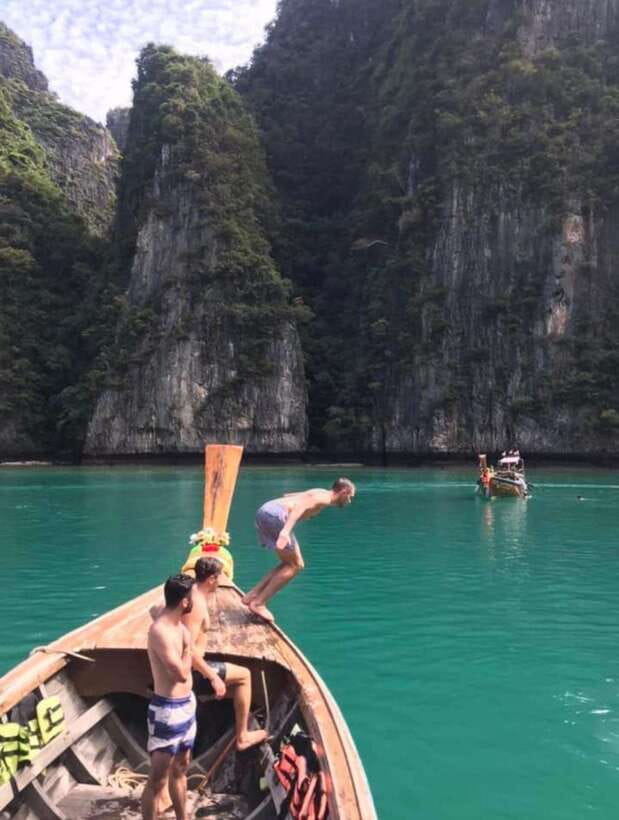From Koh Phi Phi island and 7 Islands Long Tail Boat Trip - Sunset and glowing plankton finish the day