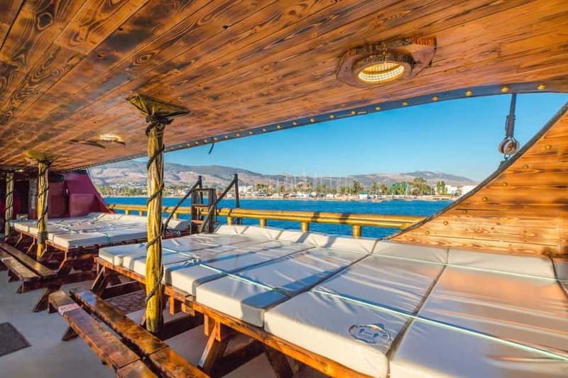 From Kos: 3-Island Boat Trip with BBQ & Water Slide - Kalymnos offers a quick look at island life