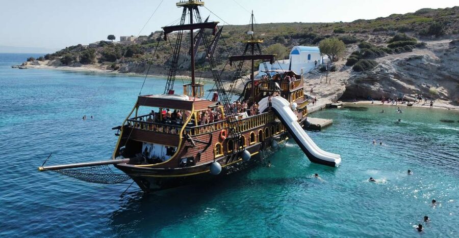 From Kos: 3-Island Pirate Cruise with Lunch and Waterslide - Sailing out on a pirate-style boat