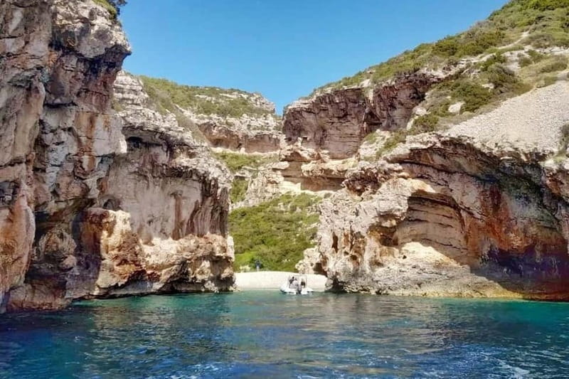 From Milna or Supetar: Magical Blue Cave Island Hopping - Hvar gives the day a historic town stop