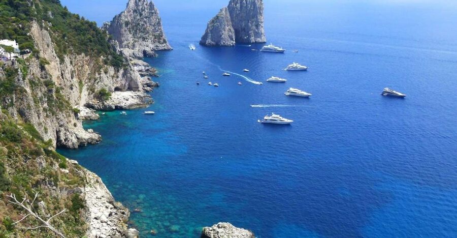 From Naples: Capri Boat Tour with Island Stop and Snorkeling - The Natural Arch and the first hour on the water