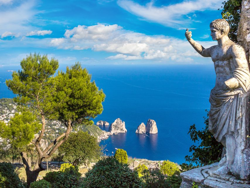 From Naples: Capri Day Trip with Ferry and Island Boat Tour - The 55-minute ferry ride along the Sorrento coast