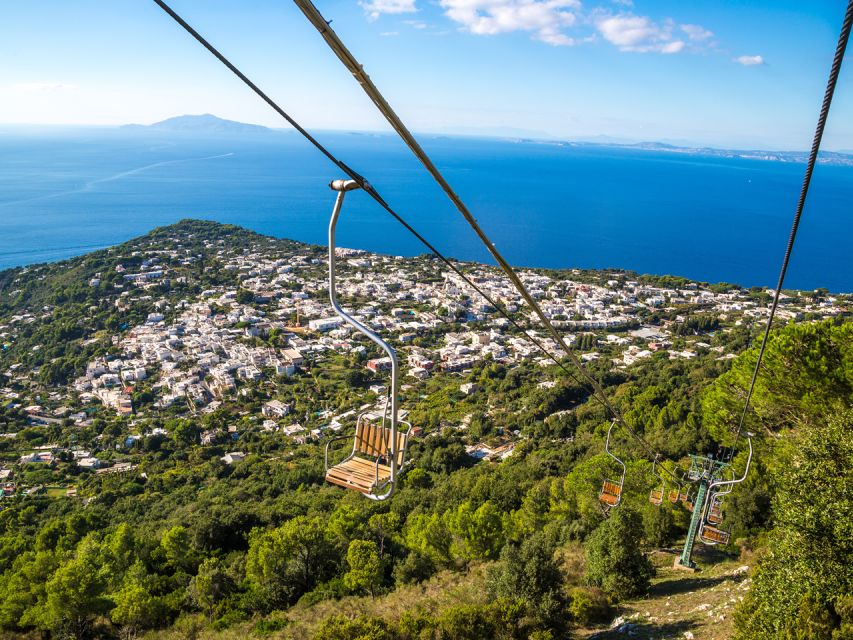 From Naples: Capri Day Trip with Ferry and Island Boat Tour - The included boat tour around Capri