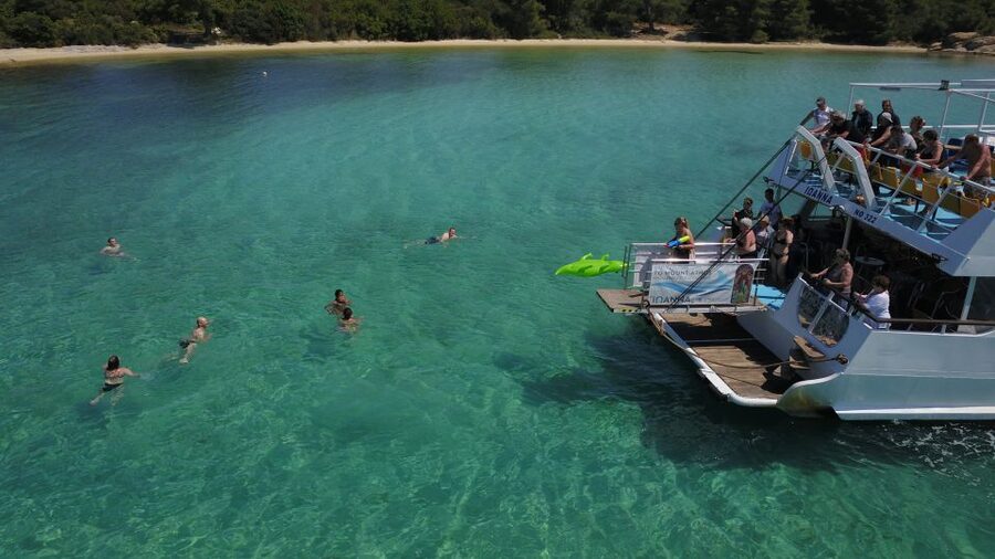 From Ouranoupoli: Blue Lagoon Two Island Cruise - Banana Beach and the included Greek lunch