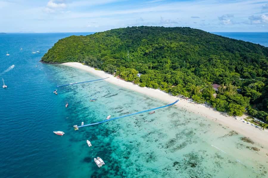 From Phuket: Coral Island Kahung Beach Speedboat Trip - From your hotel to Chalong Pier