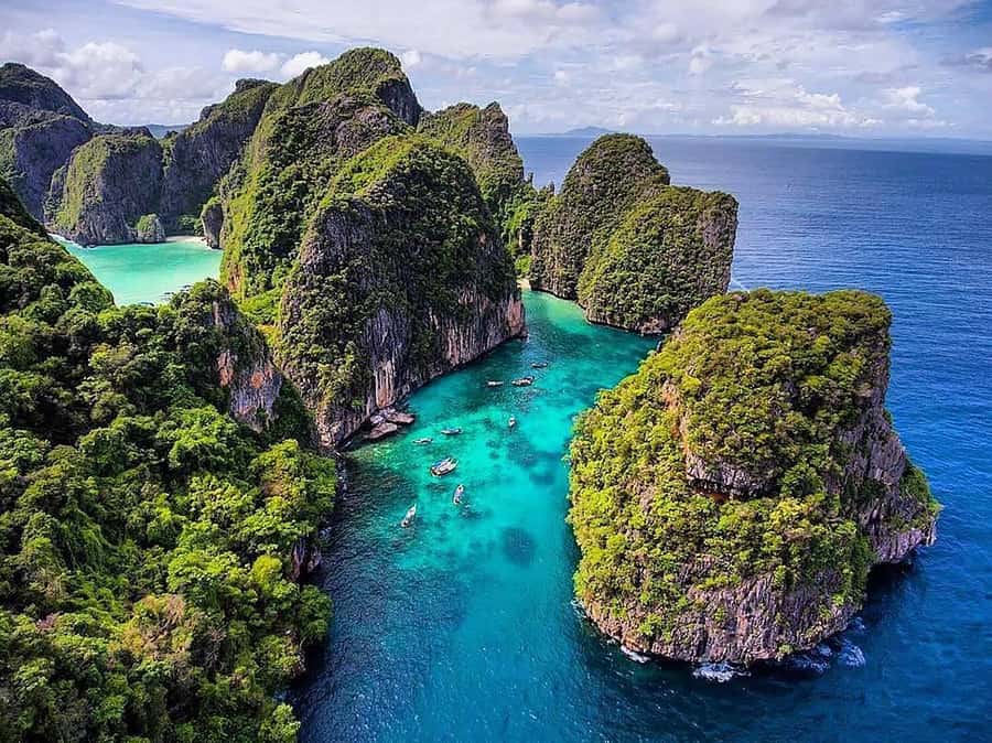 From Phuket: Phi Phi and Khai Islands Speedboat Tour - Pileh Lagoon brings the first real swim