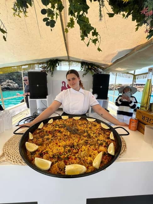 From San Antonio: Family Boat Tour to Conillera Island - Paddleboarding, swimming, and a pirate search